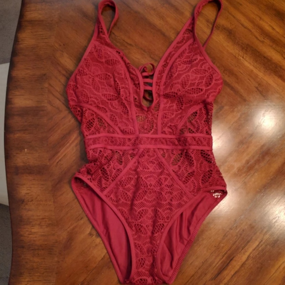 BECCA one piece burnt orange/red swimsuit